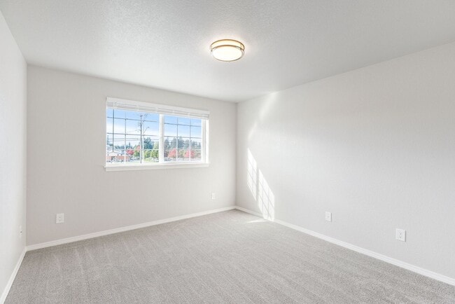 Building Photo - Recently updated 3 bdrm, 2 bath. Attached garage. Wrap around yard. Private upstairs bedroom and ...