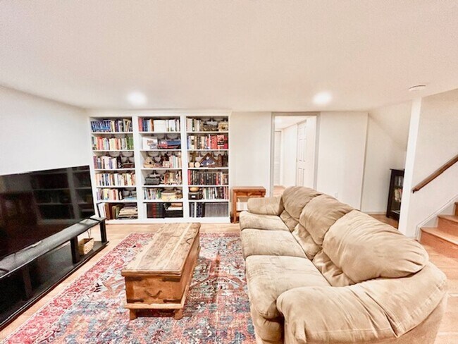 Building Photo - Beautifully renovated 4BR/3BA rambler with wraparound porch and garage