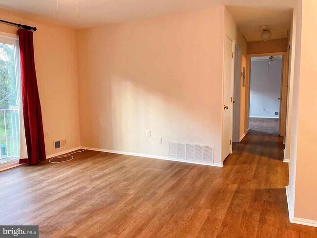 Sunny living room - 15 Azalea Ct