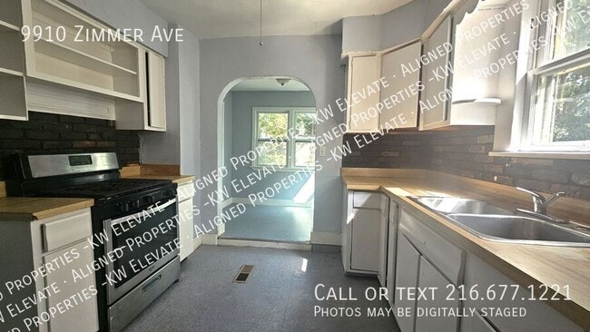 Building Photo - 9910 Zimmer Ave