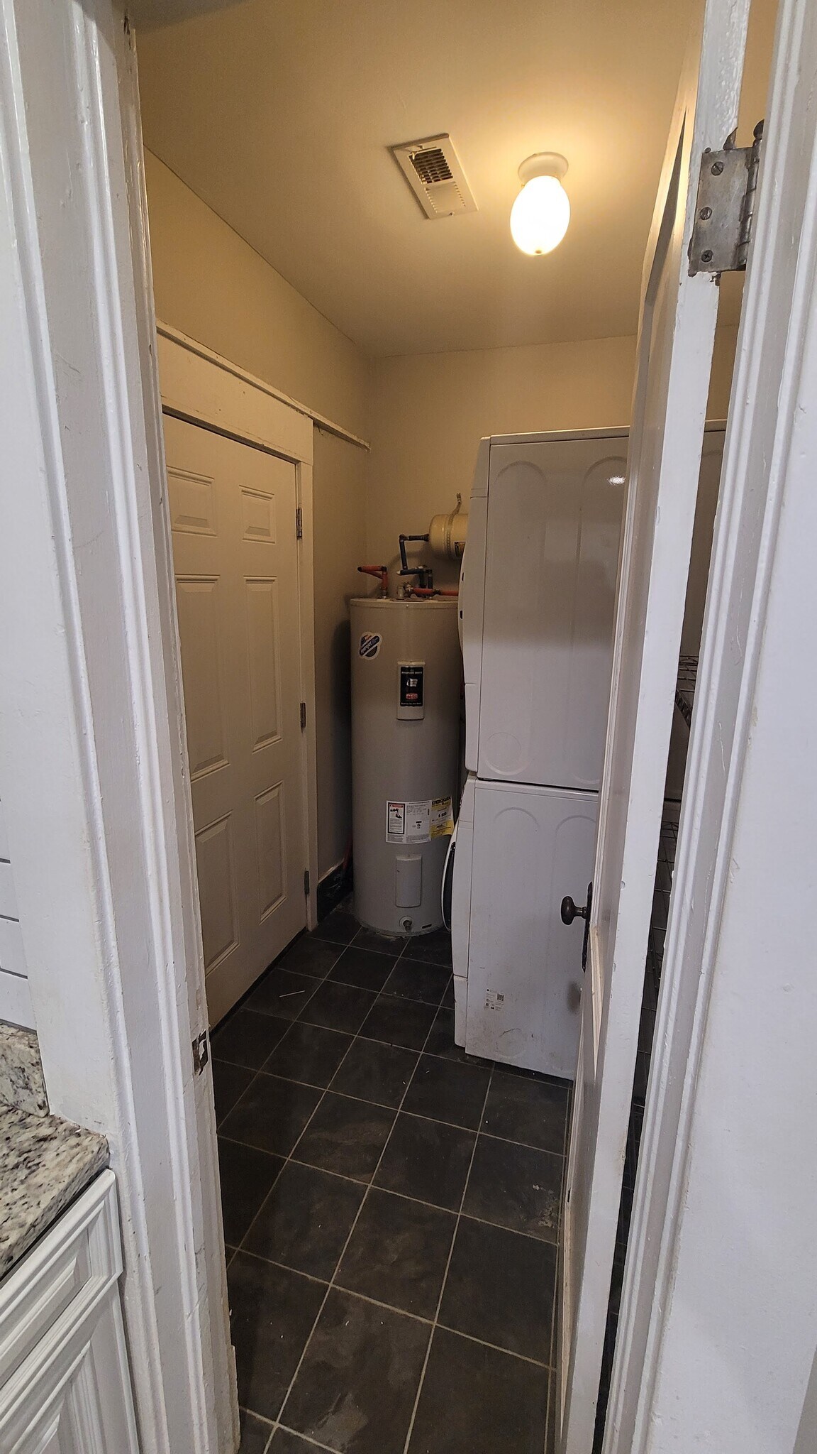 Laundry area off kitchen leads to backyard - 309 Dargan Pl SW