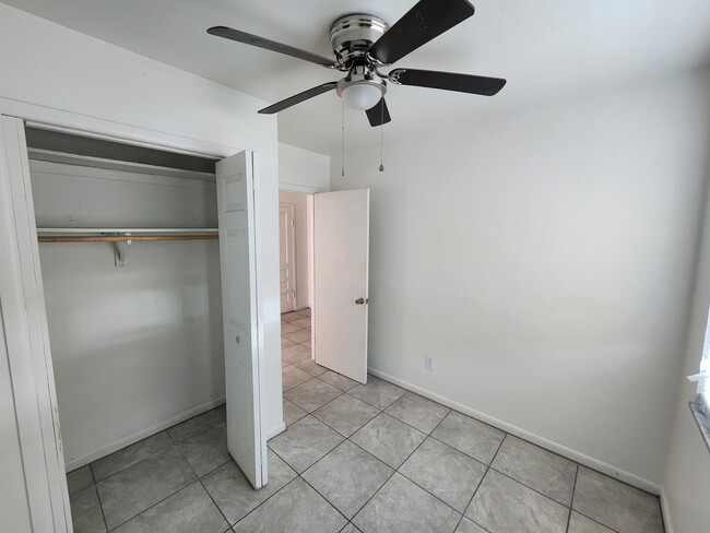 Bedroom with closet - 1302 E 149th Ave