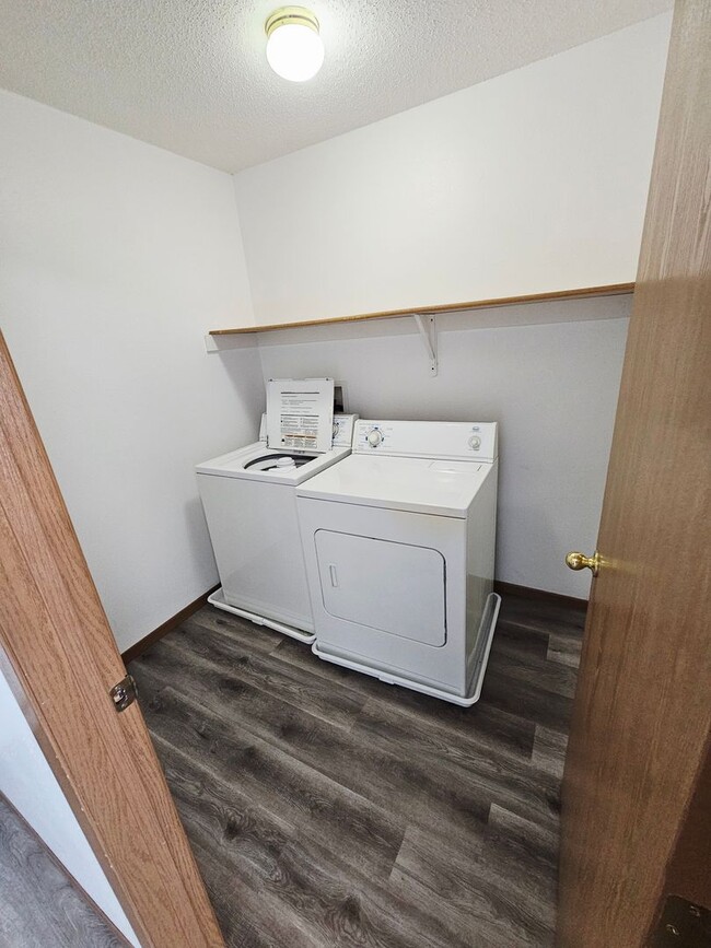 Building Photo - Fully Remodeled 1,250 Sq Ft 2 Bedroom Apartment with Garage, In-Unit Laundry & Private Balcony – ...