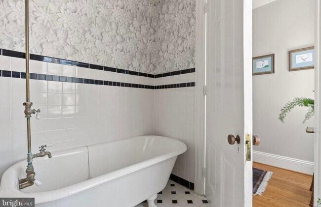2nd floor hall bath with claw foot tub - 121 W Cork St