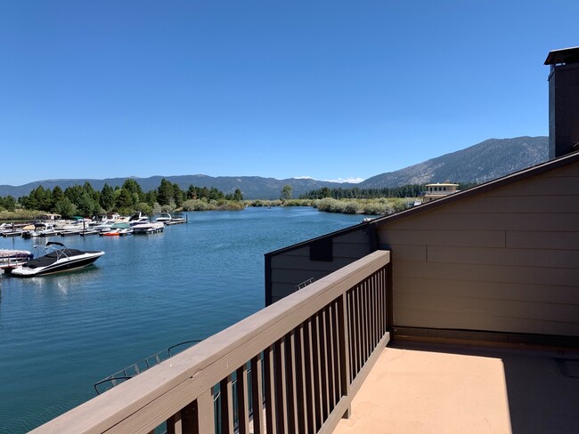 Building Photo - Secure your boat dock before summer!  Unfurnished 3 bed, 2 bath condo with marina and mountain vi...