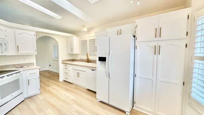 Building Photo - Light, Bright, and Freshly Updated Home in the Gated & Desirable Champagne Village 55+ Community!