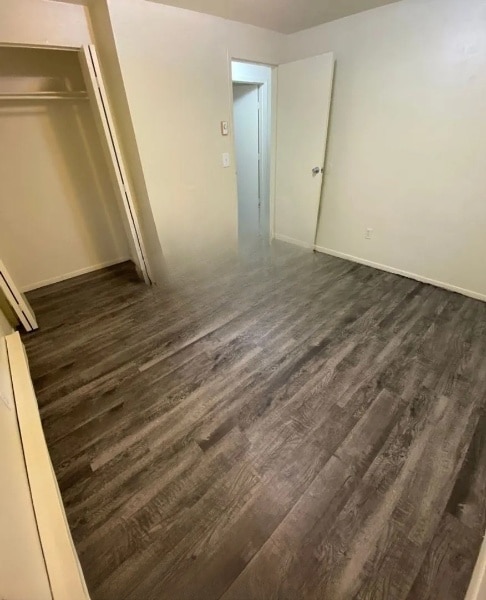 Medium-sized bedroom with 4-ft closet - 1100 E Cedar St