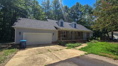 Building Photo - 5607 Whispering Pines Dr