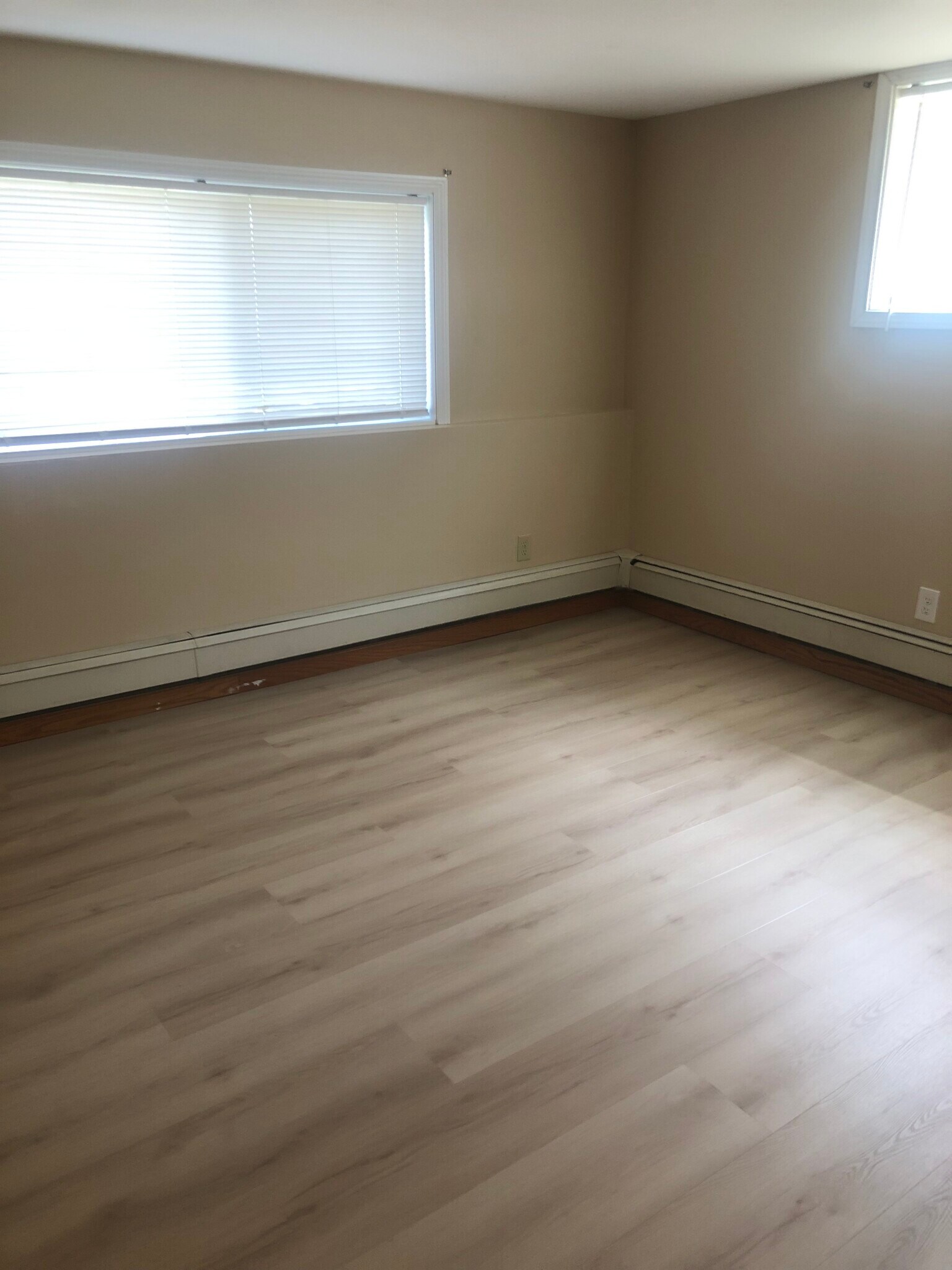 New LVP Flooring in Bedrooms - 2305 Ash Ave Nw