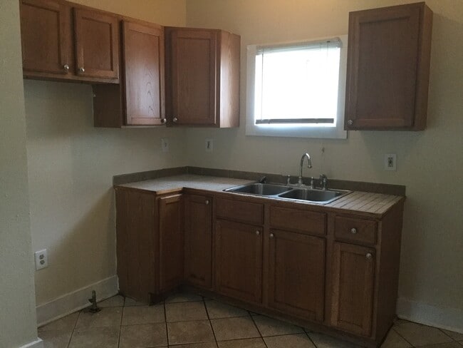 Building Photo - 3 bedroom Single Family ( Harambee )