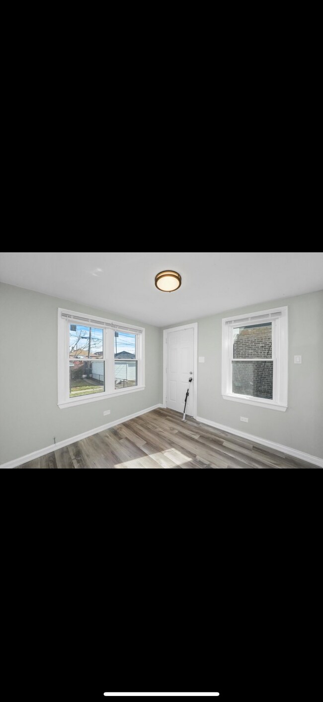 Heated Back Porch - 9339 S Eberhart Ave