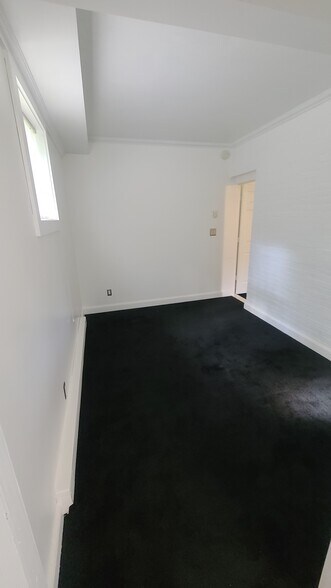 Exposed brick style bdrm fits a full mattress - 3 Cedar St