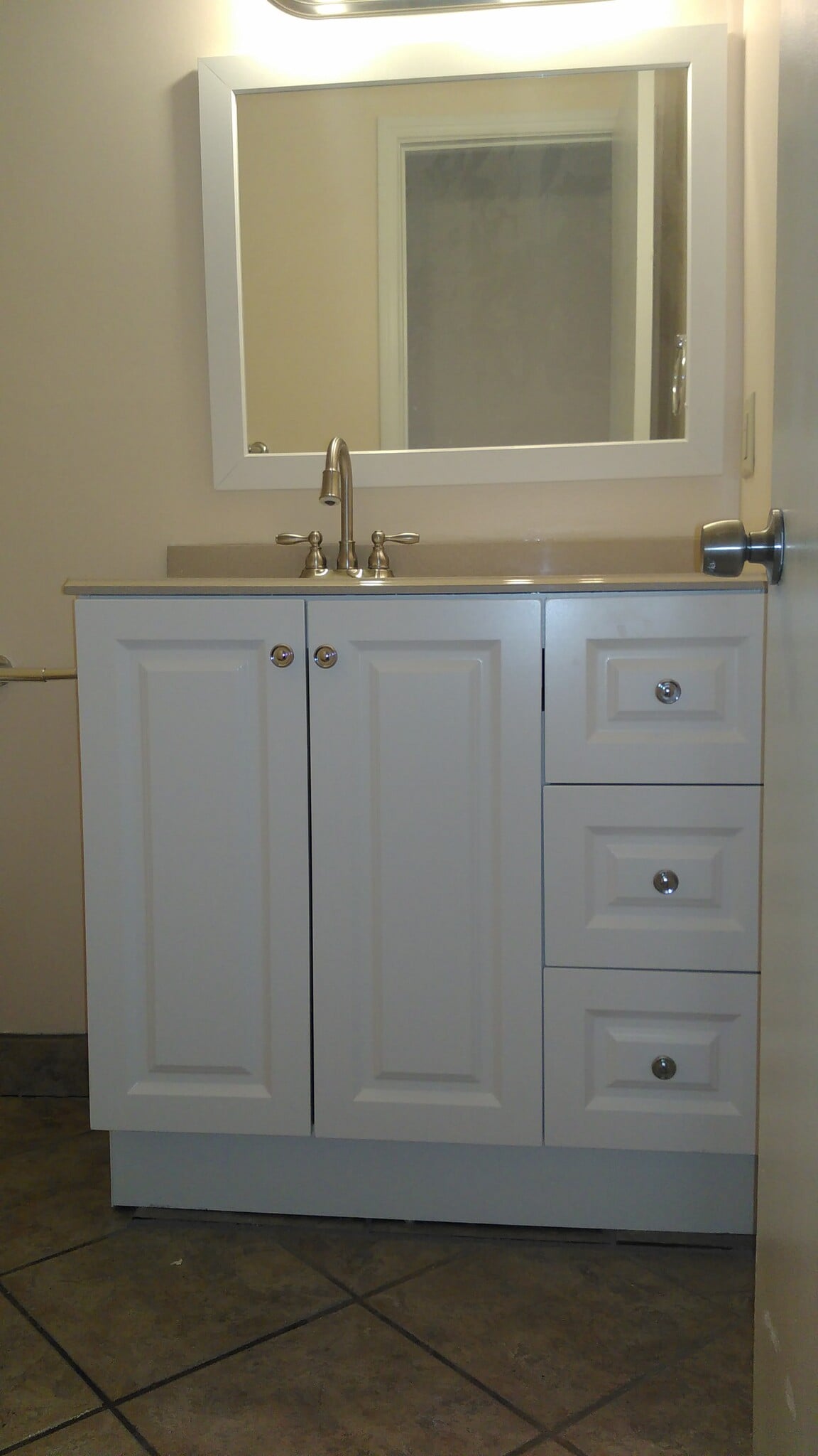 Bathroom vanity and mirror - 5980 Margie Cir SW