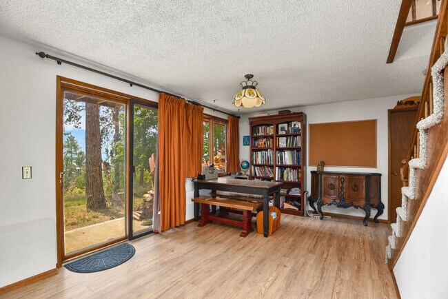 Building Photo - 2700 + sq ft family home has it all! Over 2 acres of land and a stunning view of Lake Pend Oreille