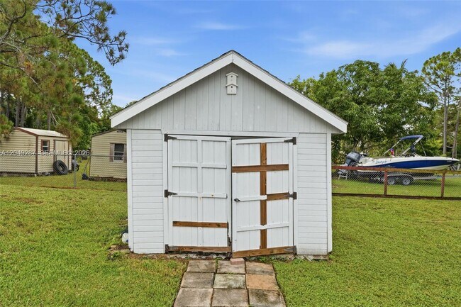 Building Photo - 12921 76th Rd N