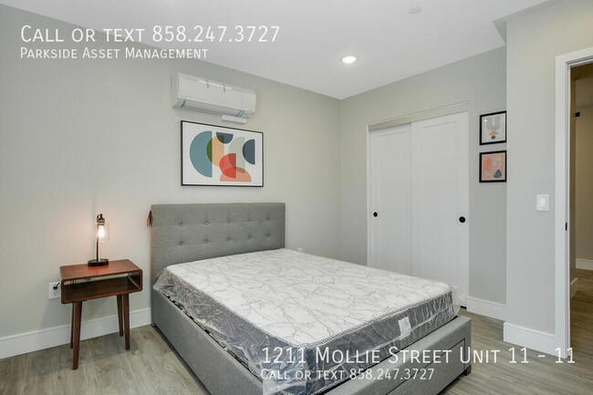 Building Photo - $1,000 Move-in Credit! The Carl on Lauretta