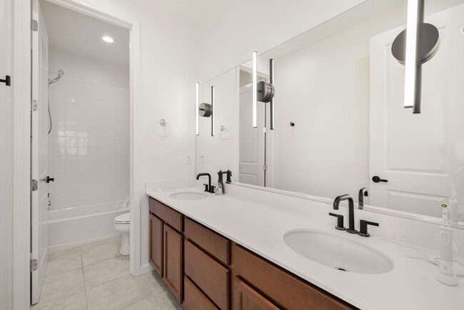 Building Photo - Beautiful 4BR/4BA home in the gated Copper View community. Features spacious living areas, mounta...