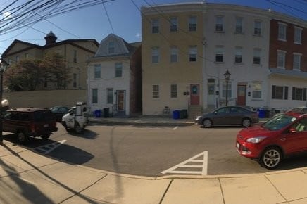 View from front stoop across the street - 225 E Hector St