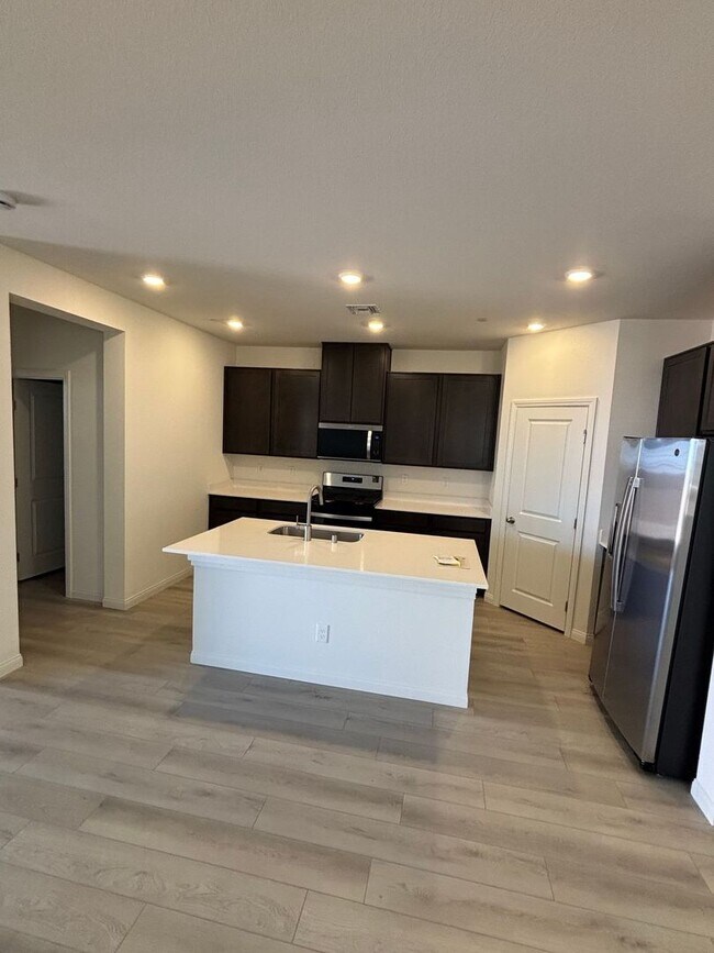 Building Photo - Modern Inspirada Living – 4 Bed Home with Loft & Downstairs Suite