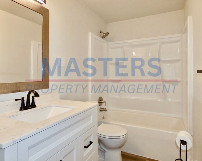 Building Photo - Three Bedroom House