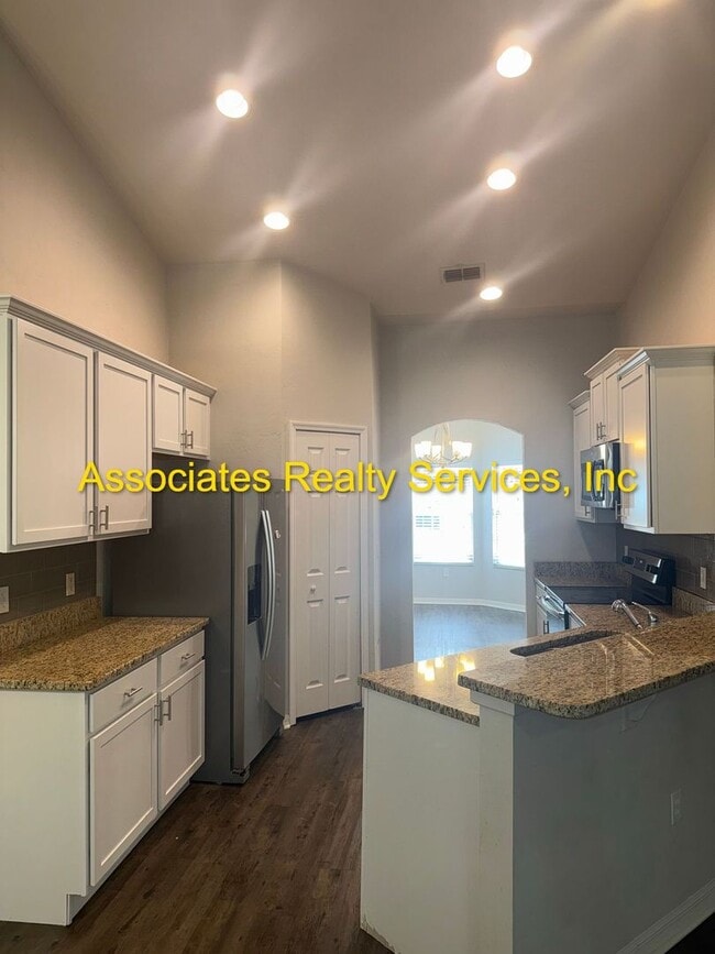 Building Photo - Spacious 4-Bedroom Home with Office in Portofino!  LOOK!