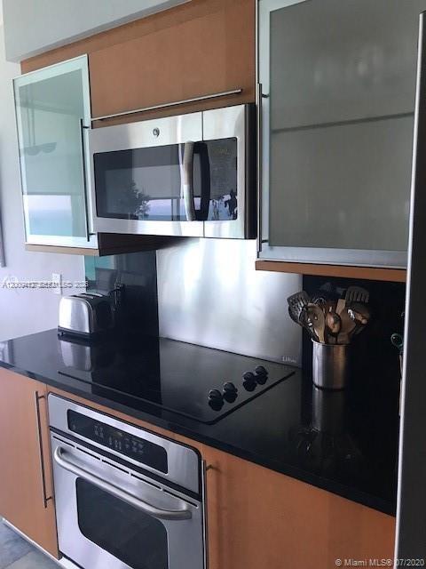 Building Photo - 6365 Collins Ave