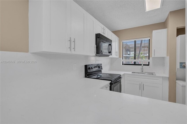 Building Photo - 6041 W 24th Ave