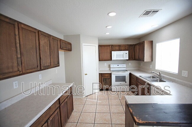 Building Photo - 12441 W Rosewood Dr