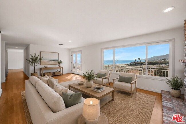 Building Photo - 6457 Surfside Way