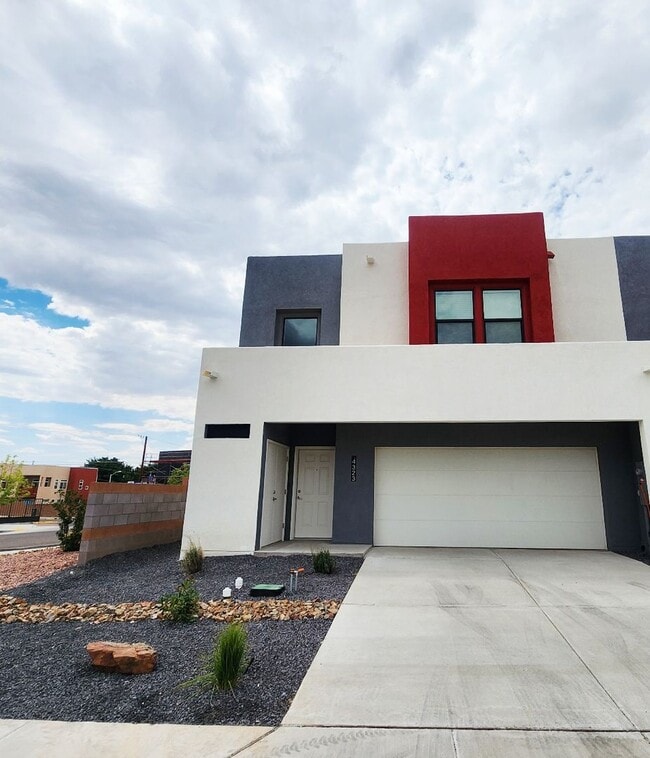Building Photo - Brand-New Construction Townhome – Never Li...