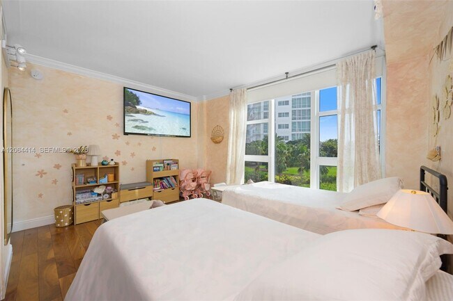 Building Photo - 10275 Collins Ave