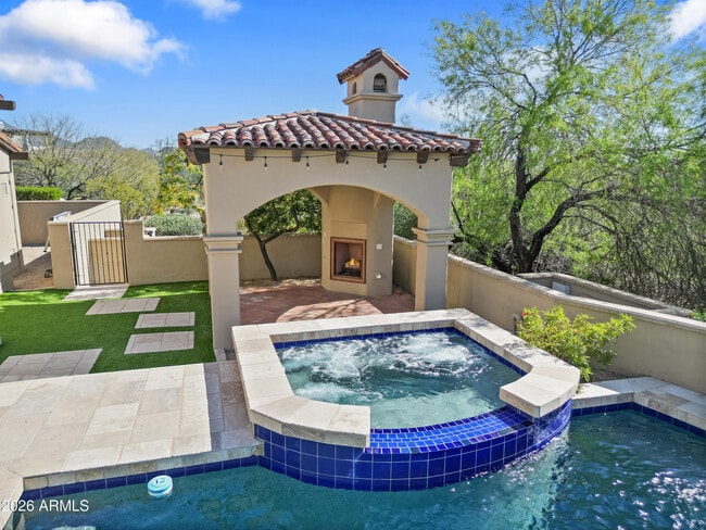 Building Photo - 9290 E Thompson Peak Pkwy