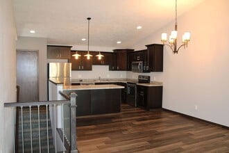 Building Photo - Spacious 3BR Townhome on Quiet Cul-de-Sac | 2,000+ Sq Ft & Attached Garage!