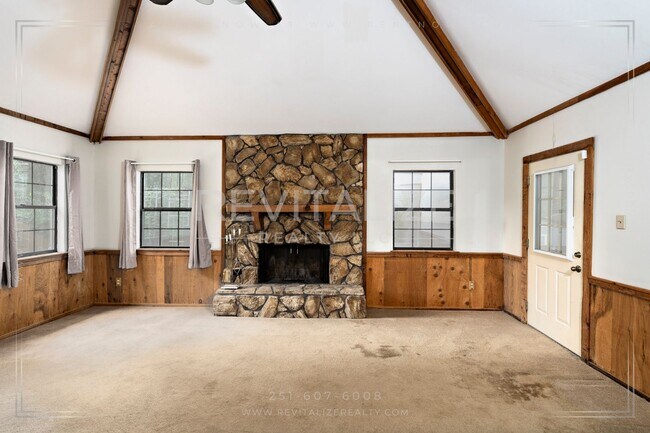 Building Photo - 3/2 Brick Home with Sunroom, Deck, and Car...