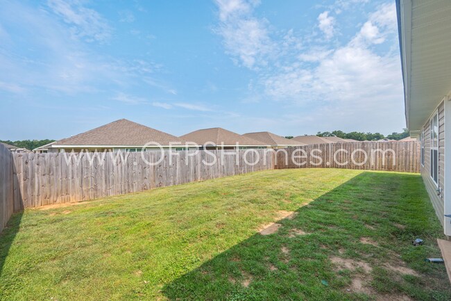Building Photo - 4/2 in Pace Community!! AVAILABLE SEPTEMBER 2026!