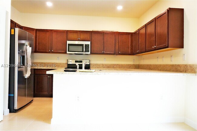 Building Photo - 9345 W 33rd Ln