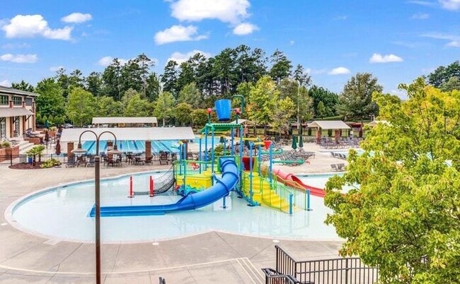 Building Photo - Charming Townhome with Open Layout, Back Patio & One-Car Garage – Near RTP, RDU & Everyday Conven...