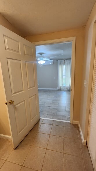 downstairs bedroom from bath - 833 Plantation Dr