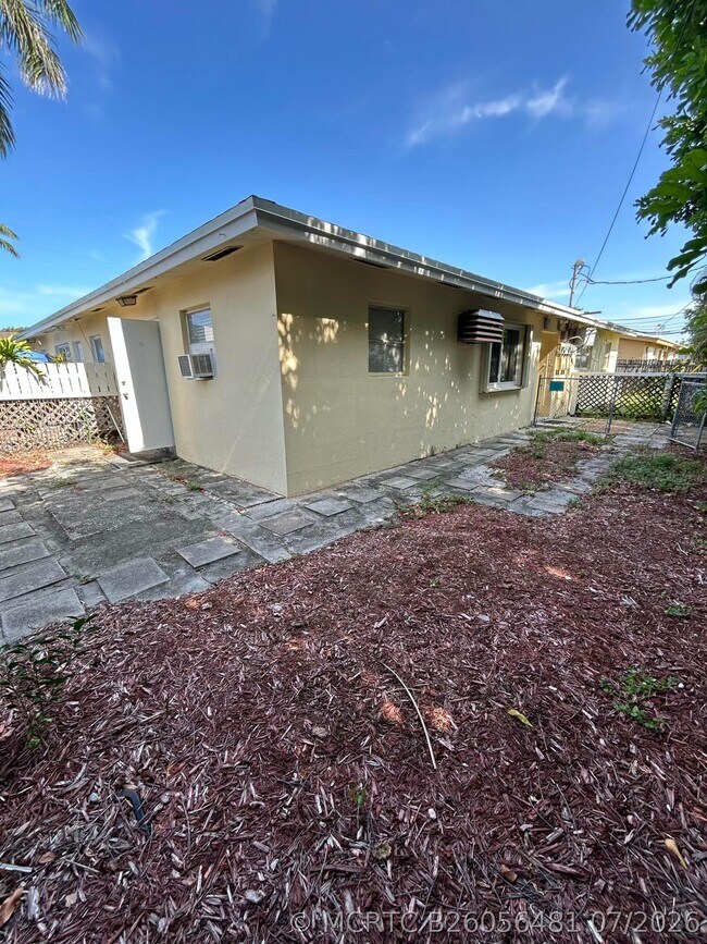 Building Photo - 5881 NE 18th Ave