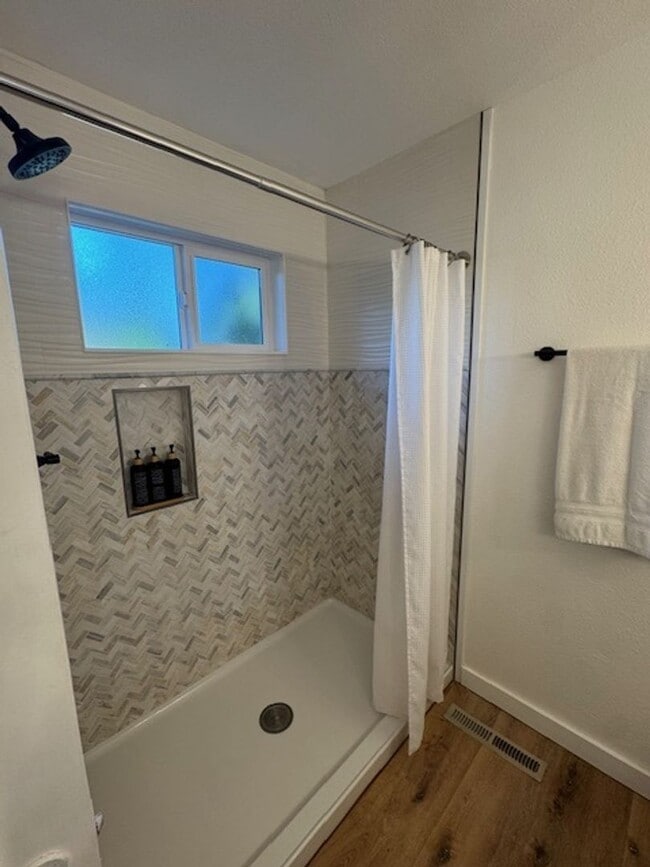 Building Photo - Beautifully Furnished and Recently Painted, Corner Lot Home Features a Fenced Backyard with an In...