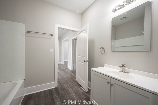Building Photo - "Charming 3-Bedroom Duplex Haven on W 29th St – Spacious 1031 Sq Ft Gem in Indianapolis!"