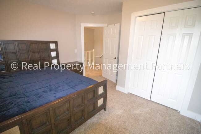 Building Photo - Spacious 3BR Townhome in Lowell | Nature Views & Maintenance-Free Living