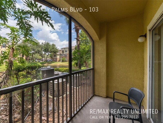 Building Photo - 10211 Courtney Palms Blvd