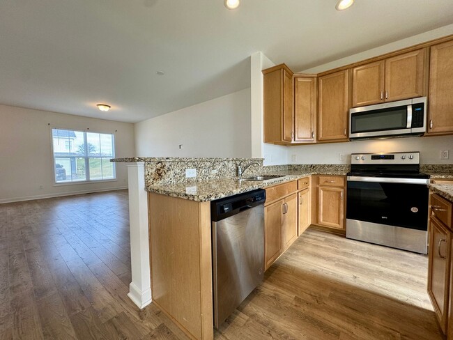 Building Photo - Modern 4 BR | 2.5 BA Townhome with Garage ...