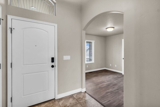 Building Photo - Spacious Syracuse Home with Covered Deck, Loft & Oversized 3-Car Garage