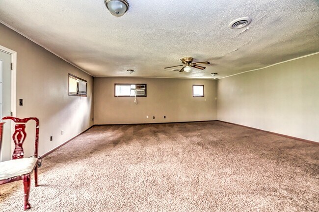 Building Photo - 4824 N Xanthus Ave