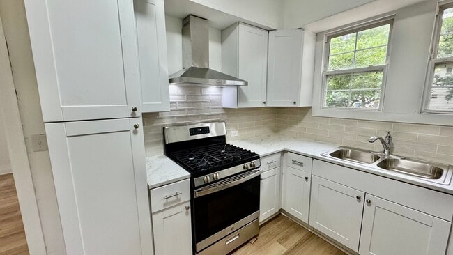 Building Photo - Spacious 3 Bedroom Home with Modern Updates & Shop