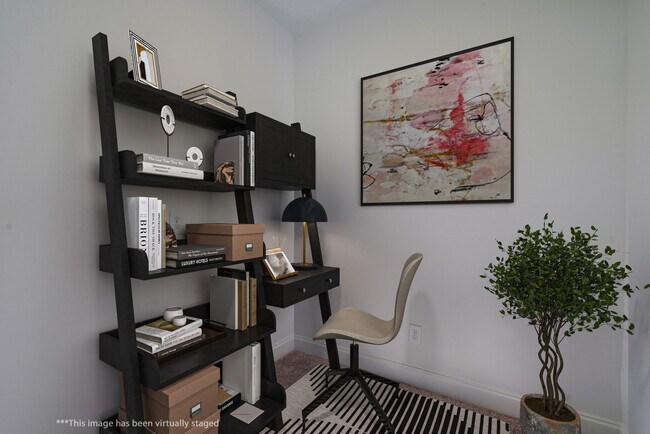 Small home office in addition to the other 2BR's. All on the one level. Staged photo - 415 Alter Ter