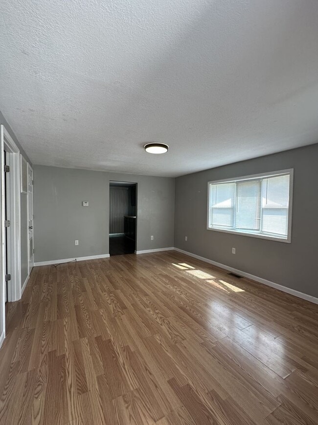 Building Photo - Big Backyard Energy | 2BR City House with County Space!