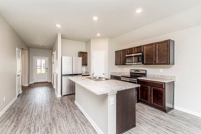 Downhall from the kitchen looking to the front door - 48465 Red Fox Dr
